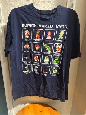 Super Mario Bros. Navy Super Mario Pixel Characters Tee L